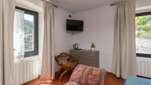 TV a/nebo společenská místnost v ubytování B&B laWanda