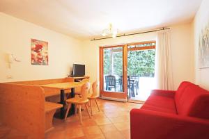 Televízia a/alebo spoločenská miestnosť v ubytovaní Aurturist S Candido Roulette + 28 fotografií