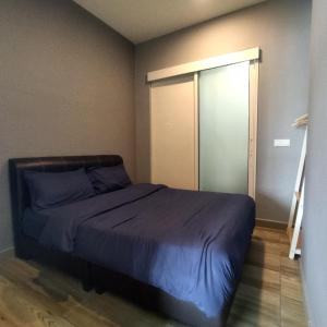 En eller flere senge i et værelse på Octagon Premium Ipoh Town Center 2BR 121 by Grab A Stay