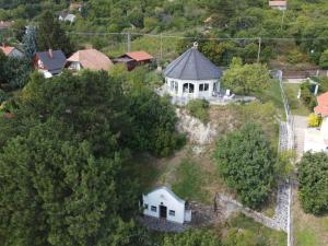 an aerial view of a white house on a hill at Panoráma Balaton in Balatongyörök