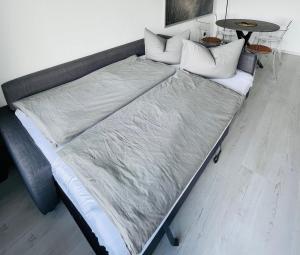 Llit o llits en una habitació de Apartment Strandkorv für 2-4 Personen mit Pool