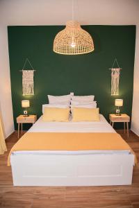 Postel nebo postele na pokoji v ubytování Casa Di Famiglia