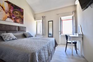 Ένα ή περισσότερα κρεβάτια σε δωμάτιο στο Sea View Apartment 40m From The Beach