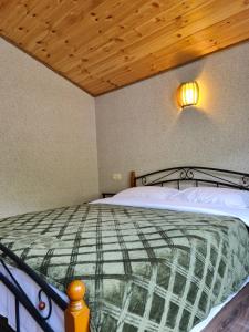 Llit o llits en una habitació de Kazbegi 4U