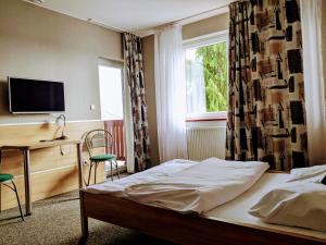 Llit o llits en una habitació de MDS Wielichowo