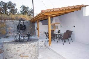 A patio or other outdoor area at Seafront Villa Eirini