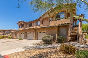 a large house with a garage at Cochise #1056 Scottsdale condo in Scottsdale