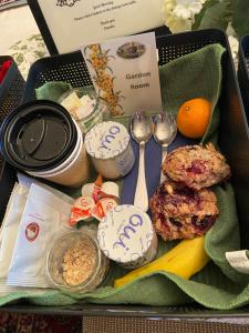 a lunch box filled with food and utensils at Marina Street Inn in Morro Bay