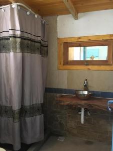 Ett badrum på Comunidad Monte Pasubio