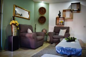 Khu vực ghế ngồi tại Apartment Stasha with free access to gym