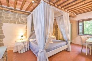 Postel nebo postele na pokoji v ubytování Hotel Relais San Lorenzo