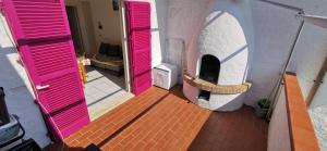 Ένα ή περισσότερα κρεβάτια σε δωμάτιο στο NUMANA, Bilocale con ampio balcone