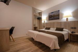 Katil atau katil-katil dalam bilik di Hotel Marco Polo