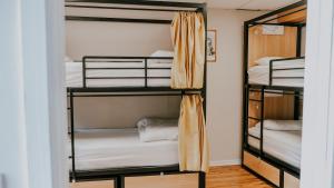 a room with four bunk beds in a room at Garden Lane Backpackers in Dublin