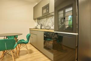 Kuchyň nebo kuchyňský kout v ubytování SUNLIGHT BRONZE Plus - Szeged
