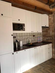 Köök või kööginurk majutusasutuses Happy Holidays Apartments in New Gudauri