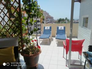 Posezení v ubytování Habitacion Familiar en un Ático con gran terraza y,cocina ,en la playa