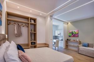 A bed or beds in a room at Cuore di Sorrento Suites