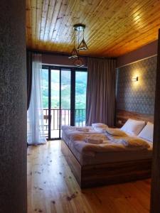 Voodi või voodid majutusasutuse Best view Kazbegi toas