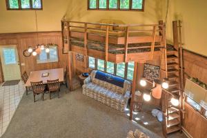 an overhead view of a room with a loft bed at Rogers Cabin with Direct Access to Beaver Lake! in Garfield