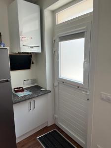 Kuchnia lub aneks kuchenny w obiekcie A de Maria - Tres Marias Apartments