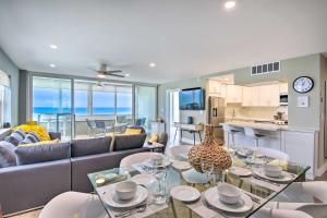 a living room with a couch and a table at Oceanfront Luxury 2and2 Condo with Amazing Views! in Fort Lauderdale