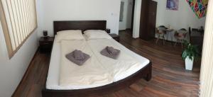 A bed or beds in a room at Sentami