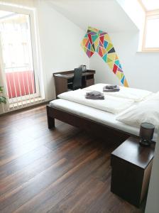 A bed or beds in a room at Sentami