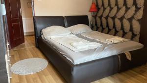 Postel nebo postele na pokoji v ubytování Bristol Apartments