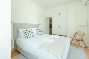 Postel nebo postele na pokoji v ubytování Trindade 19 Apartments - 1C Fernão Pires