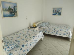 Łóżko lub łóżka w pokoju w obiekcie Panorama Apartments