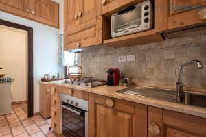 Virtuvė arba virtuvėlė apgyvendinimo įstaigoje Appartamento Cavour 54