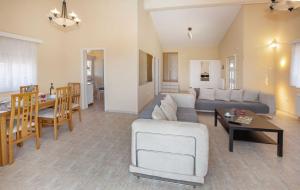 A seating area at Villa with Private S Pool-Theologos by GHH