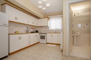 A kitchen or kitchenette at Villa with Private S Pool-Theologos by GHH