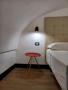 Letto o letti in una camera di All'1 di Rajno' Relaxing ApartHotel