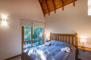 Postel nebo postele na pokoji v ubytování Balcones del Sayhueque