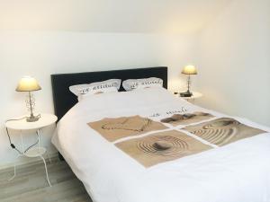 Postel nebo postele na pokoji v ubytování Hotel Halleux