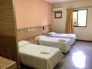 Postel nebo postele na pokoji v ubytování Hotel Rinkao
