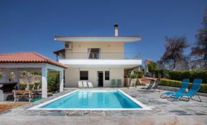 The swimming pool at or close to Villa with Private S Pool-Theologos by GHH