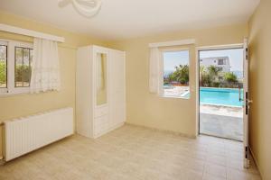 The swimming pool at or close to Villa with Private S Pool-Theologos by GHH