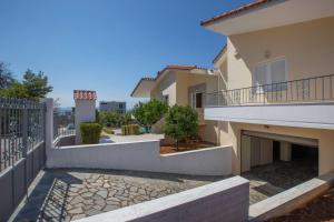 A balcony or terrace at Villa with Private S Pool-Theologos by GHH