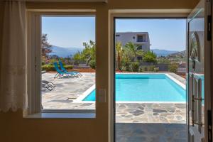 The swimming pool at or close to Villa with Private S Pool-Theologos by GHH