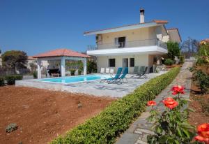 The swimming pool at or close to Villa with Private S Pool-Theologos by GHH
