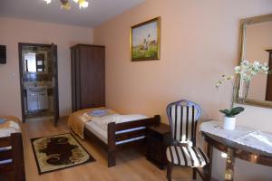 Posedenie v ubytovaní Hotelik Pod Lwami