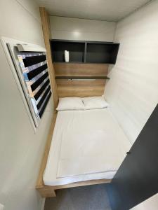 Posteľ alebo postele v izbe v ubytovaní D&I mobile home