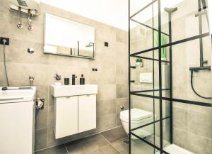 Phòng tắm tại Luxury Heritage Apartment Zara Antica +16 ảnh