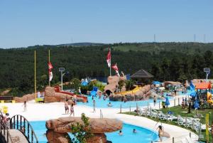 a large water park with people playing in it at SOFT ROOMS in Vila Real