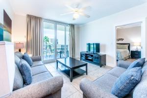 a living room with a couch and a table at Waterscape 235-A in Fort Walton Beach