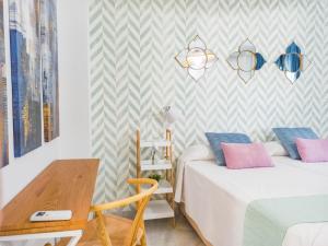Postel nebo postele na pokoji v ubytování Expoholidays- Eucalipto 5º1