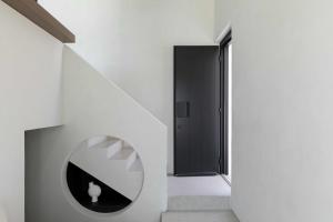 Foto da galeria de CUBIC Mykonos Seafront Design Suites em Ornos